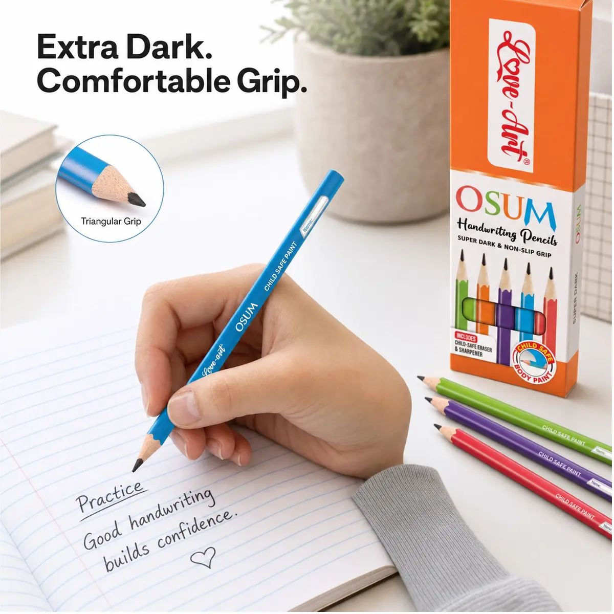 Hand writing with an Osum extra-dark pencil featuring a comfortable triangular grip